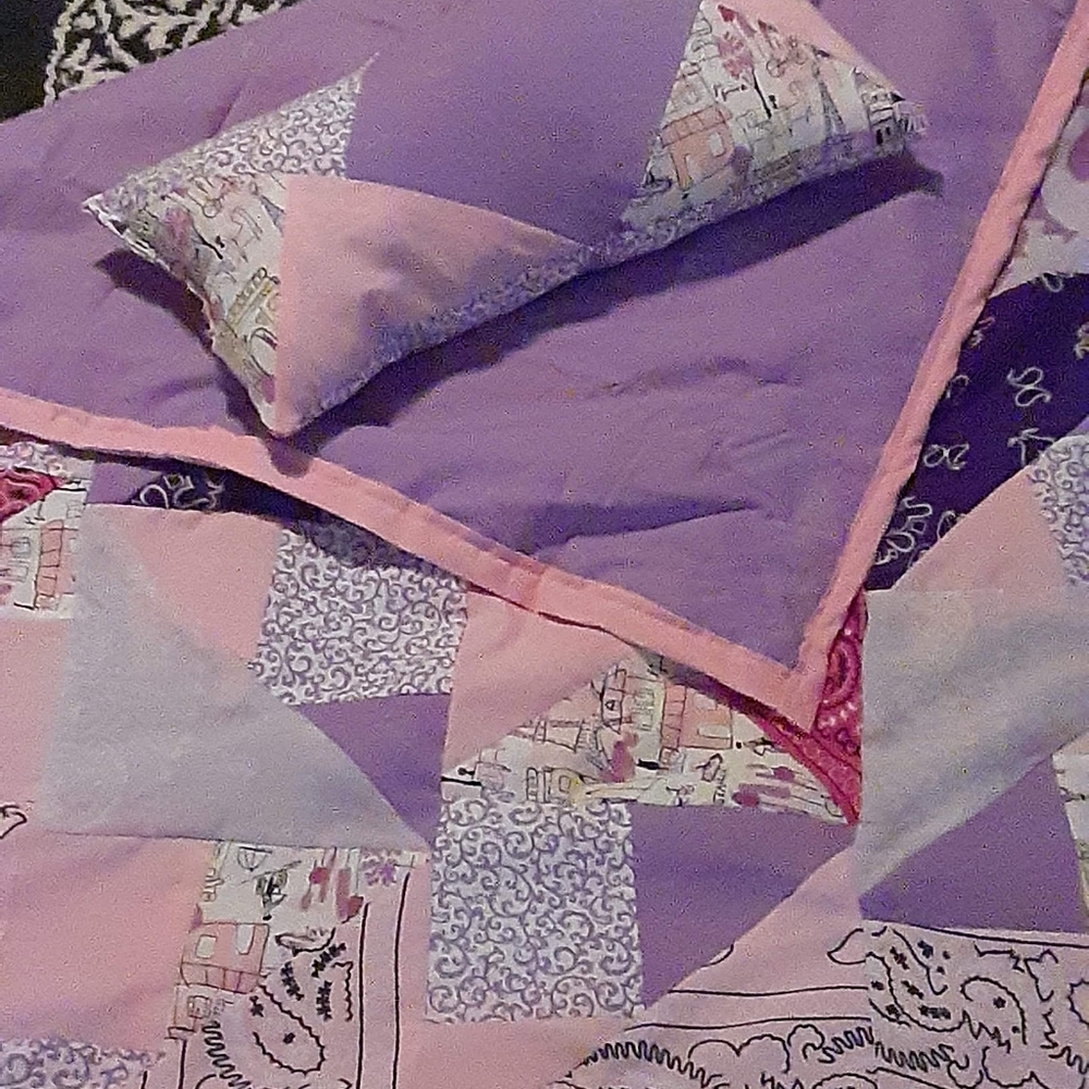 Homemade baby girls quilt with pillow